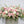 Load image into Gallery viewer, A photo of a Full Casket Cover made with white and pale pink flowers.
